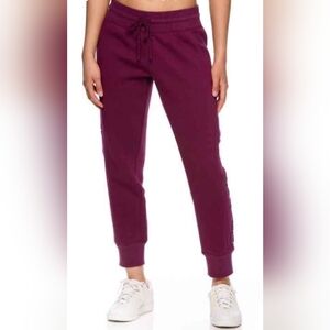 Brand NEW Women's Reebok Cuffed Jogger Pants In A Grape Wine Color. Size XXL